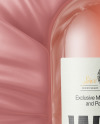 Clear Glass Pink Wine Bottle Lying on a Silk Cloth Mockup