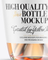 Clear Glass Bottle With Orange Wine Mockup