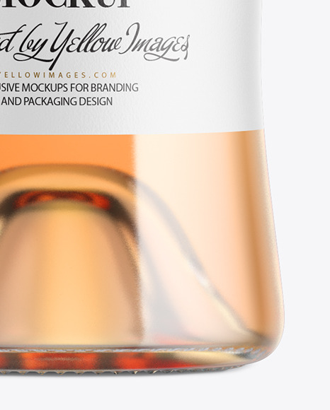 Clear Glass Bottle With Orange Wine Mockup