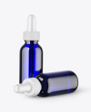 Two Blue Glass Dropper Bottles Mockup Two Blue Glass Dropper Bottles Mockup