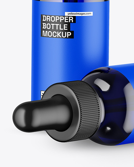 Two Blue Glass Dropper Bottles Mockup Two Blue Glass Dropper Bottles Mockup