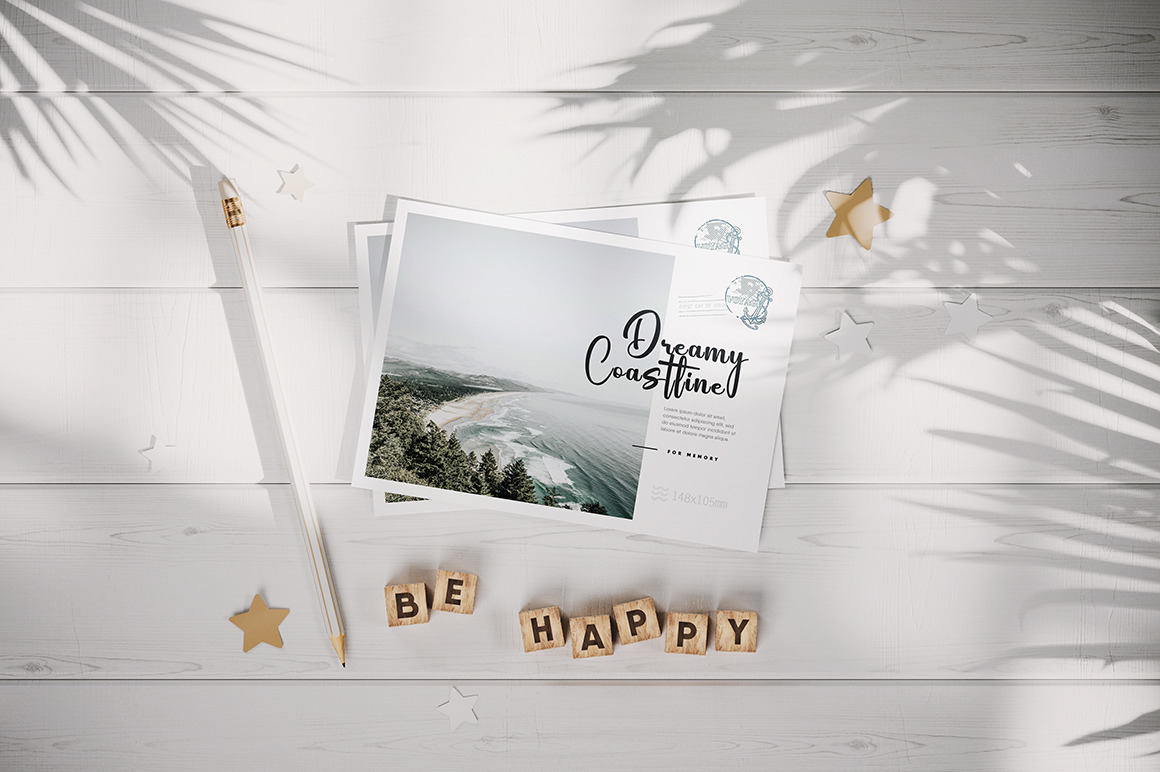 Postcard on the White Wooden Surface Mockup Postcard on the White Wooden Surface Mockup