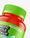 Glossy Plastic Bottle with Flying Gummies Mockup