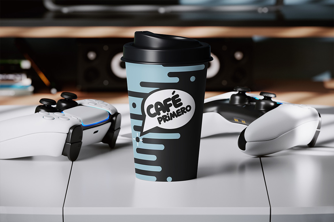 Paper Coffee Cup with Gamepads Mockup Paper Coffee Cup with Gamepads Mockup