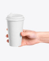 Coffee Cup in a Hand Mockup