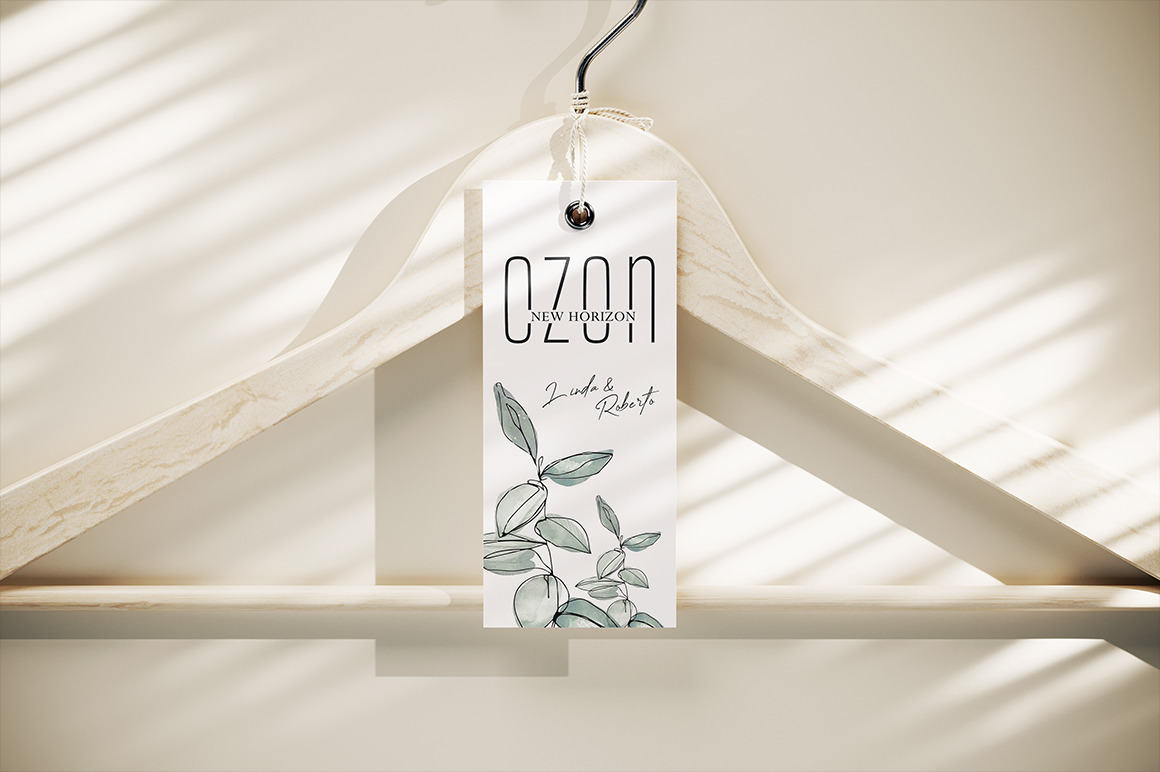 Clothes Tag with Cord on Wooden Hanger Mockup