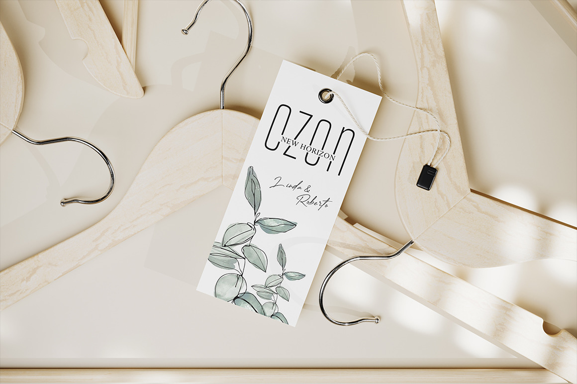 Clothes Tag with Cord on Wooden Hanger Mockup