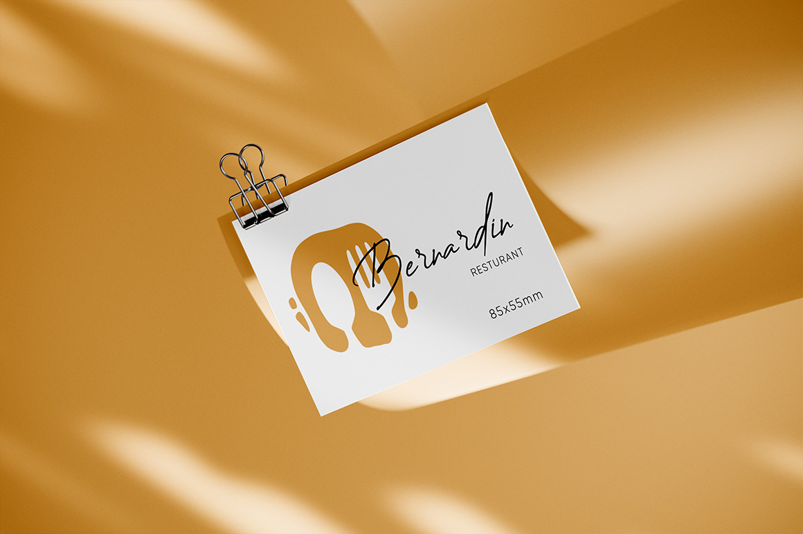 Business Card with Clip on Rolled Paper Mockup Business Card with Clip on Rolled Paper Mockup