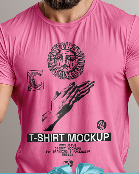 Bearded Man Wearing a Tight Fit T-Shirt Holds a Gift Box Mockup