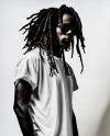 Black Man with Dreadlocks Wearing a T-Shirt and Sunglasses Mockup