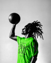 Black Man with Dreadlocks Holding a Ball & Wearing a T-Shirt Mockup