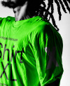 Black Man with Dreadlocks Holding a Ball & Wearing a T-Shirt Mockup