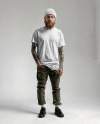 An Irishman with Tattoos Wearing a T-Shirt, Beanie Hat and Pants Mockup