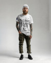 An Irishman with Tattoos Wearing a T-Shirt, Beanie Hat and Pants Mockup