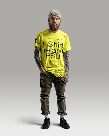 An Irishman with Tattoos Wearing a T-Shirt, Beanie Hat and Pants Mockup