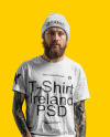 An Irishman with Tattoos Wearing a T-Shirt, Beanie Hat and Pants Mockup