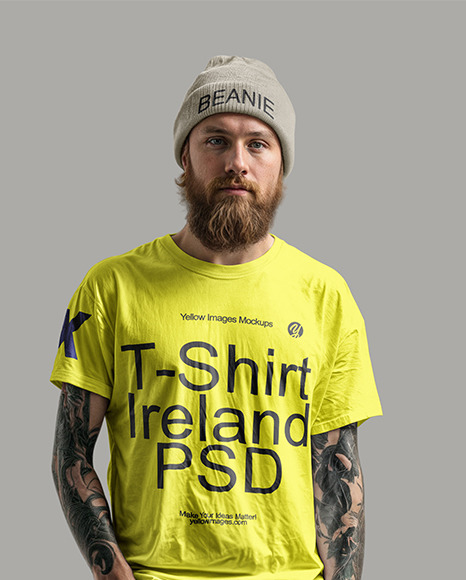 An Irishman with Tattoos Wearing a T-Shirt, Beanie Hat and Pants Mockup