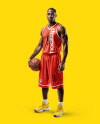 Black Man Wearing a Full Basketball Kit Mockup