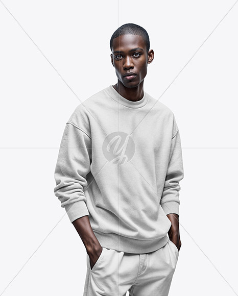 Man Wearing an Oversize Sweatshirt and Pants Mockup