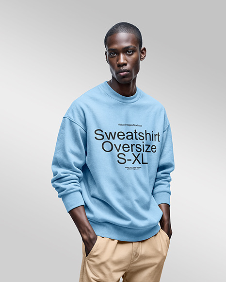 Man Wearing an Oversize Sweatshirt and Pants Mockup
