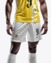 A Black Man Wearing a Full Soccer Kit with a Ball Mockup