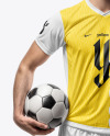 A Man with a Ball Wearing a V-Neck Soccer Jersey and Shorts Mockup