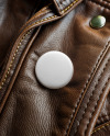 Pin-Back Button on a Brown Leather Jacket Mockup