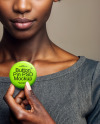 African Woman Holding a Button Pin Mockup