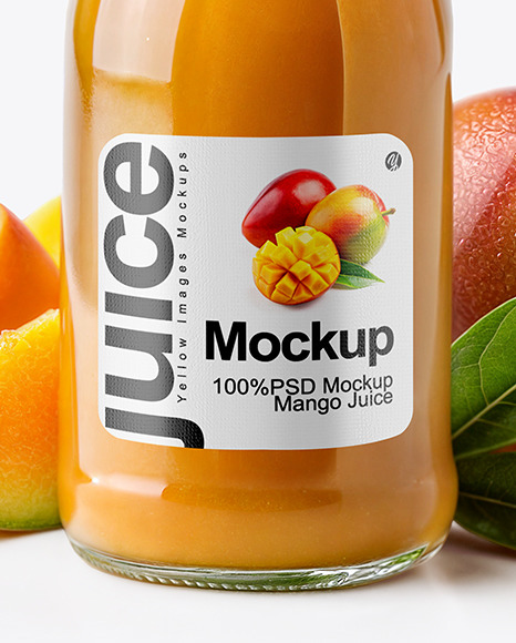 A Bottle of Mango Juice with Mango Pieces and Green Leafs Mockup