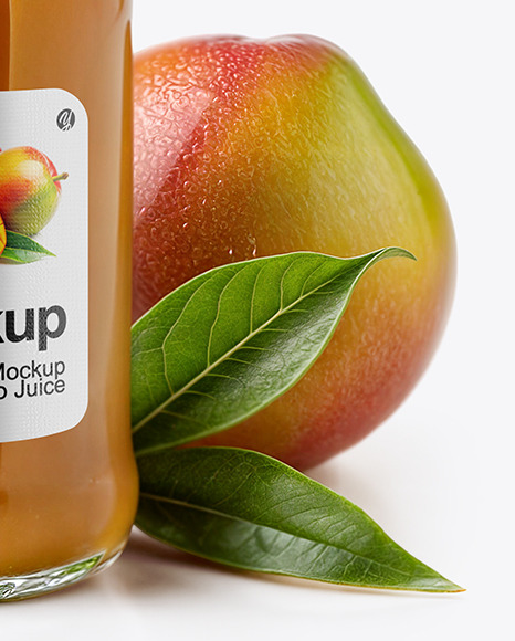 A Bottle of Mango Juice with Mango Pieces and Green Leafs Mockup