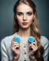 Young Woman Holding Two Button Pins Mockup