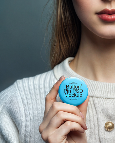 Young Woman Holding Two Button Pins Mockup