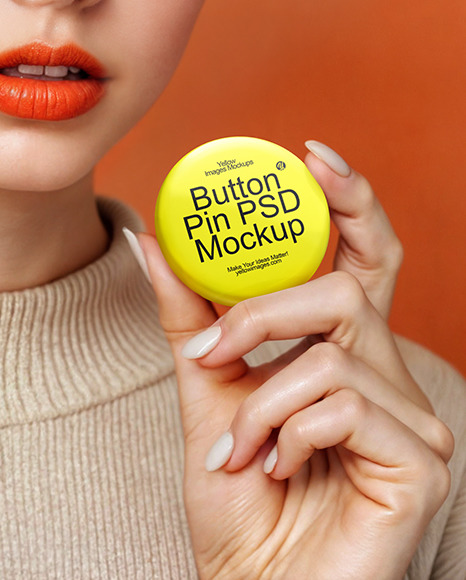 Young Woman Holding a Pin-Back Button Mockup
