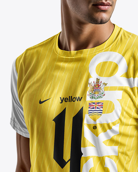 Man Wearing a Crew Neck Soccer Jersey and Shorts Mockup