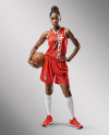 Black Woman Wearing a Full Basketball Kit with Ball Mockup