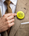 Man Wearing Tweed Jacket Point at Pin-Back Button Mockup