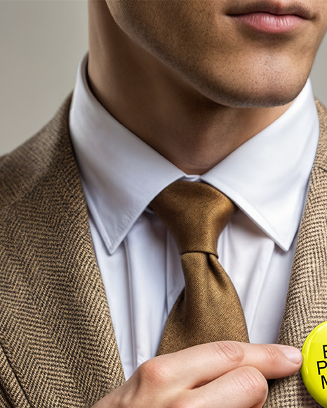 Man Wearing Tweed Jacket Point at Pin-Back Button Mockup