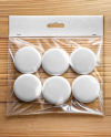 6 Pin-Back Buttons in Transparent Plastic Pack Mockup