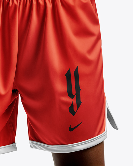 Female Basketball Player Wearing a V-Neck Jersey and Shorts Mockup
