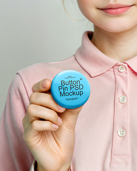 Young Girl Holding a Button Pin Mockup