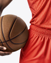 Female Basketball Player Wearing a V-Neck Jersey and Shorts Mockup
