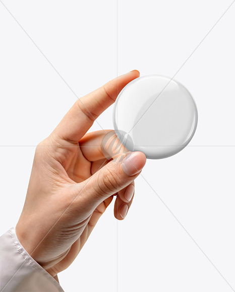 Hand Holding a Pin-Back Button Mockup