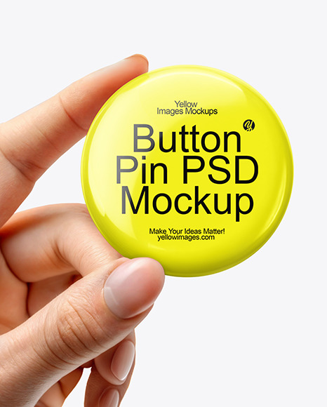 Hand Holding a Pin-Back Button Mockup
