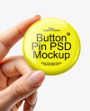 Hand Holding a Pin-Back Button Mockup