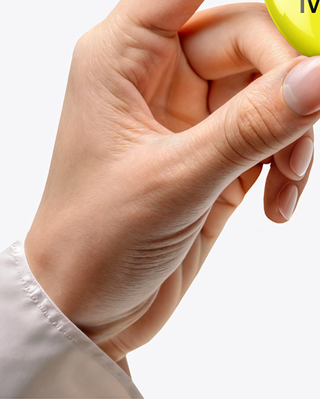 Hand Holding a Pin-Back Button Mockup