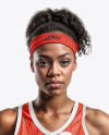 Woman Wearing a V-Neck Basketball Jersey and Shorts with a Ball Mockup
