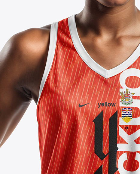 Woman Wearing a V-Neck Basketball Jersey and Shorts with a Ball Mockup