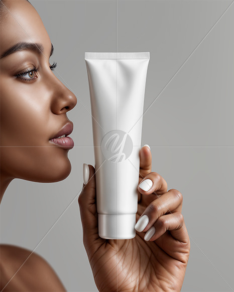 Black Woman Holding Cosmetic Tube in a Hand Mockup