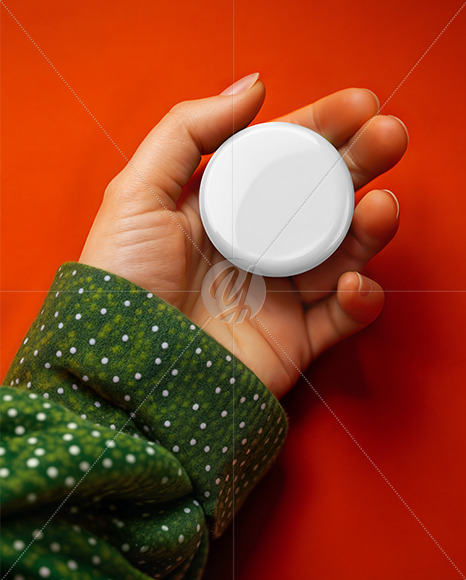 Female Hand Holding a Pin-Back Button Mockup