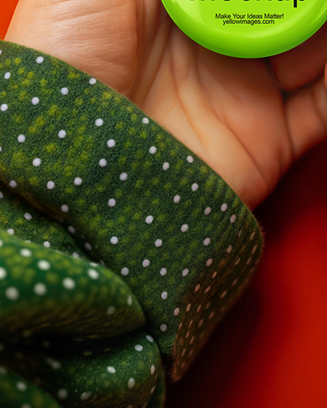 Female Hand Holding a Pin-Back Button Mockup